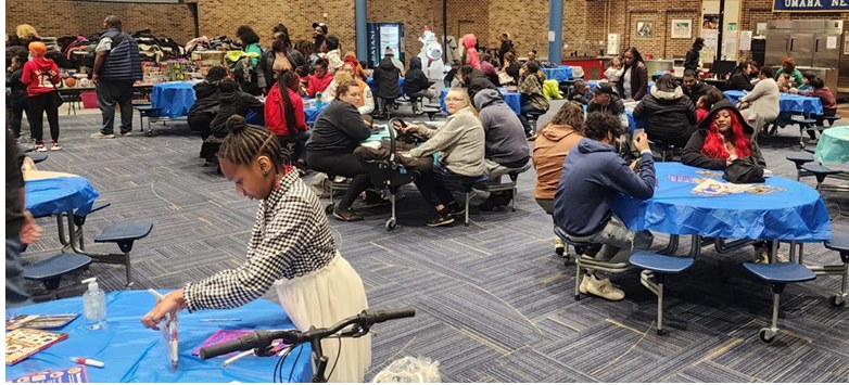 Families gathered at a community health and resource event