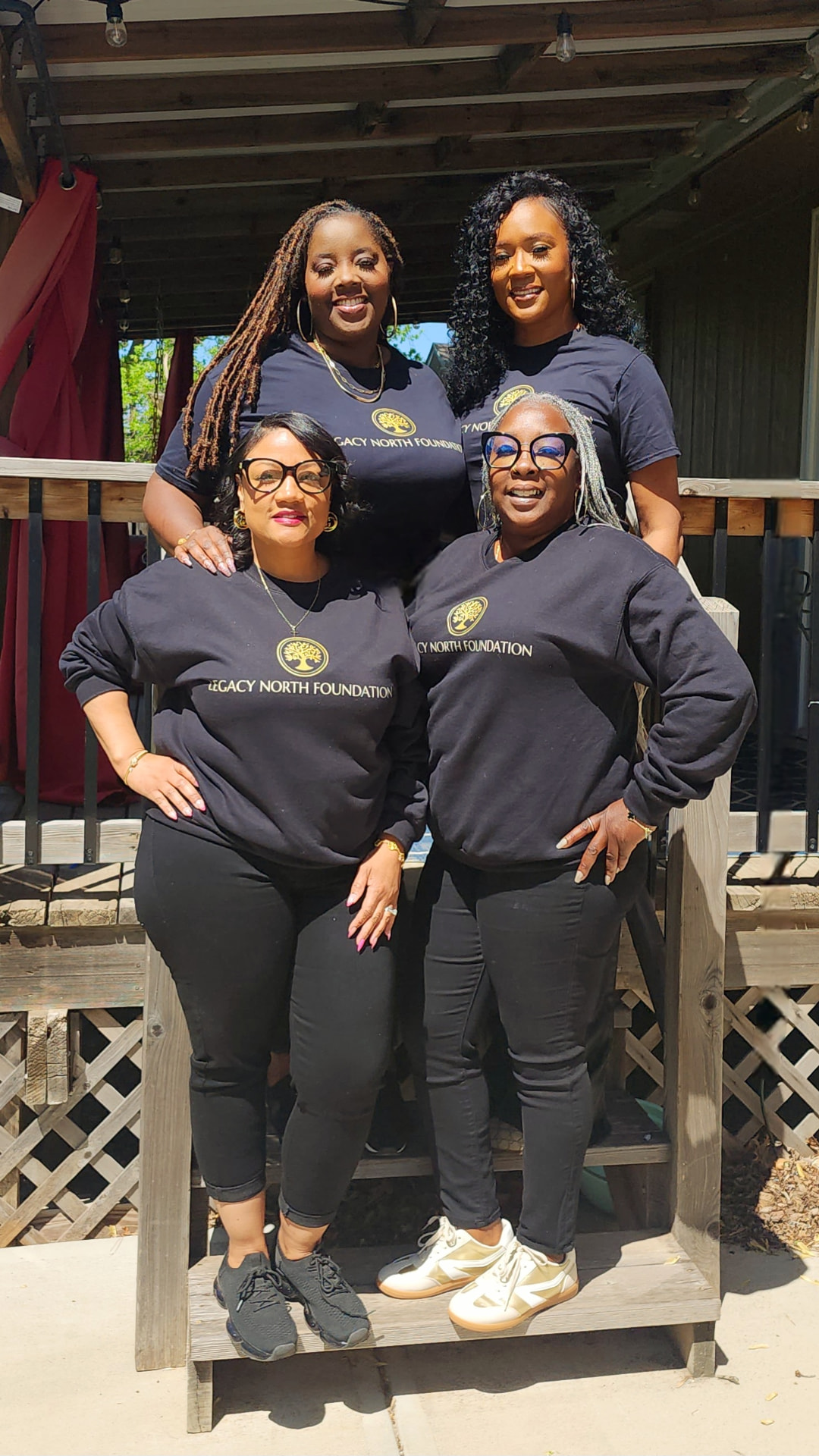 Legacy North Foundation leadership team together outside a community event