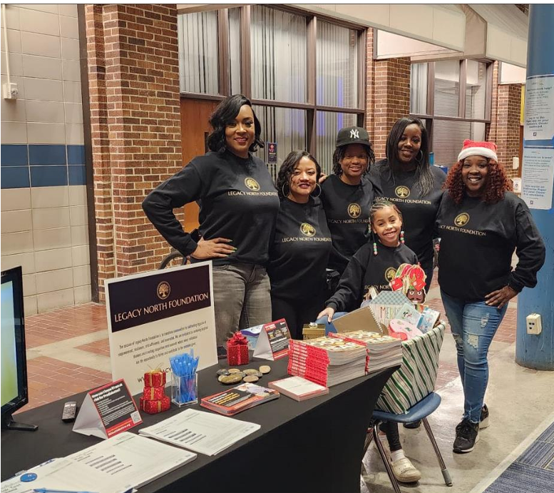 Legacy North Foundation team and young helpers at the diabetes awareness resource table